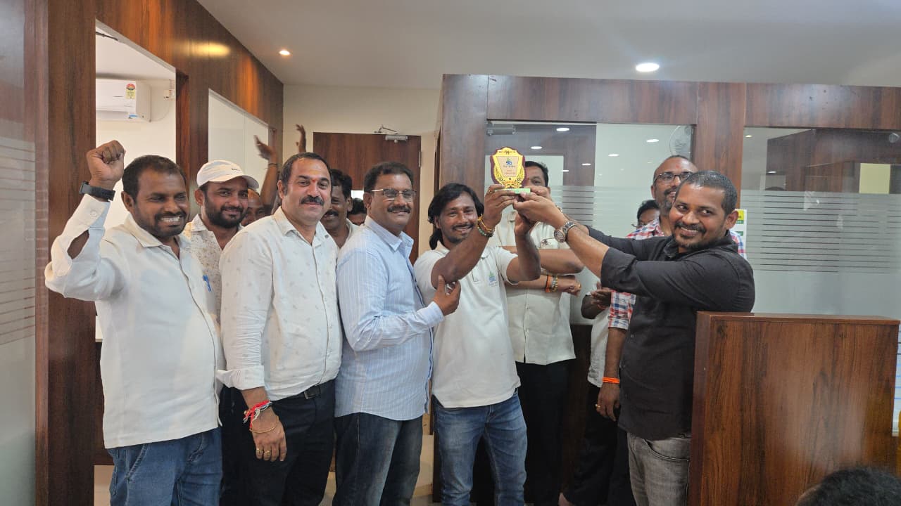 Sai Infra Developers Director Somesh celebrating a team achievement with colleagues